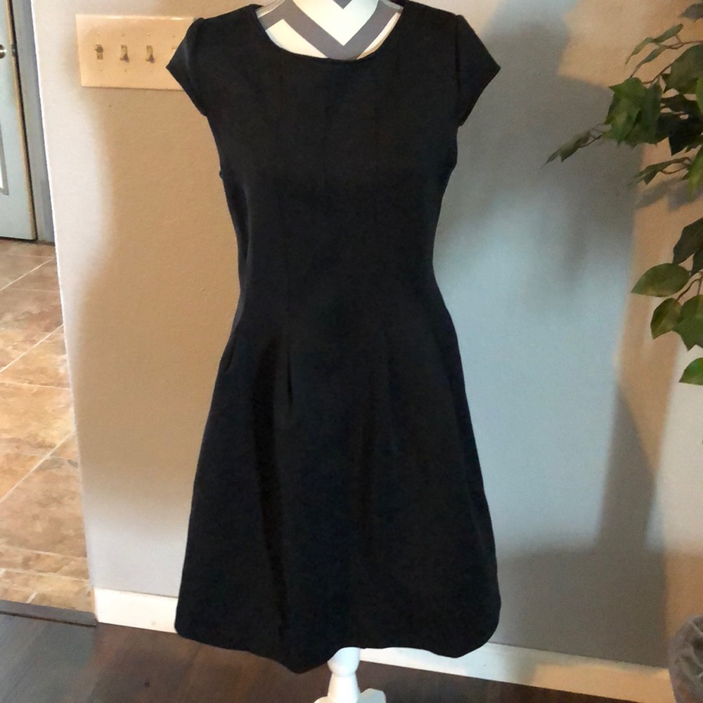 Metaphor black dress